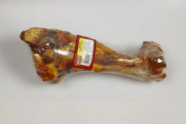 Dino been verpakt in krimpfolie